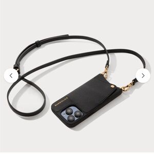 Bandolier “Emma” crossbody phone in black/gold